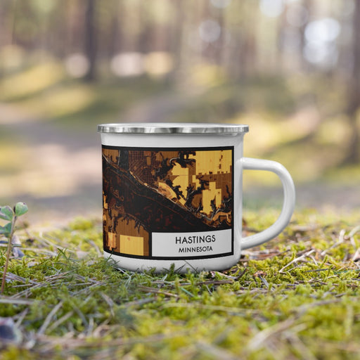 Right View Custom Hastings Minnesota Map Enamel Mug in Ember on Grass With Trees in Background