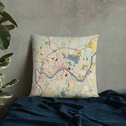 Custom Haverhill Massachusetts Map Throw Pillow in Woodblock on Bedding Against Wall