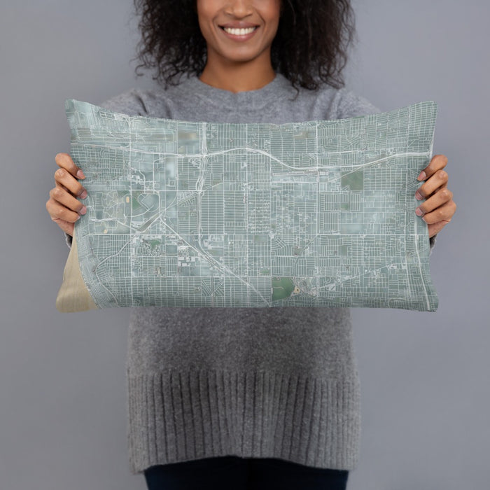 Person holding 20x12 Custom Hawthorne California Map Throw Pillow in Afternoon