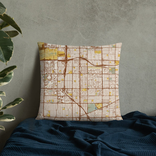 Custom Hawthorne California Map Throw Pillow in Woodblock on Bedding Against Wall