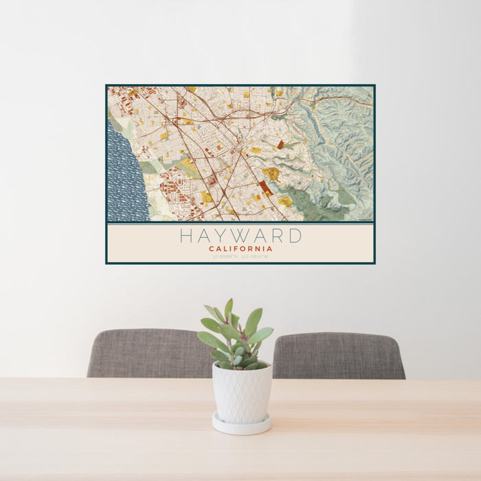 24x36 Hayward California Map Print Lanscape Orientation in Woodblock Style Behind 2 Chairs Table and Potted Plant