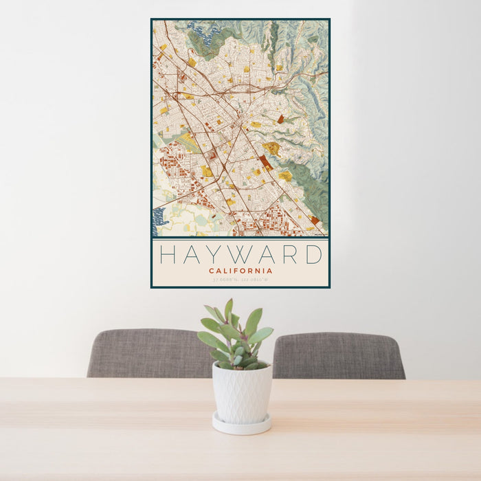 24x36 Hayward California Map Print Portrait Orientation in Woodblock Style Behind 2 Chairs Table and Potted Plant