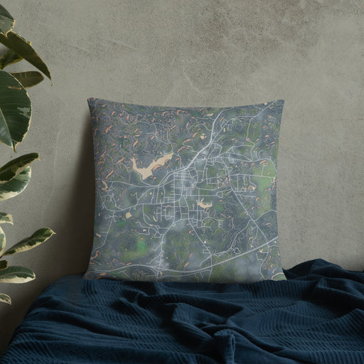 Custom Heflin Alabama Map Throw Pillow in Afternoon on Bedding Against Wall