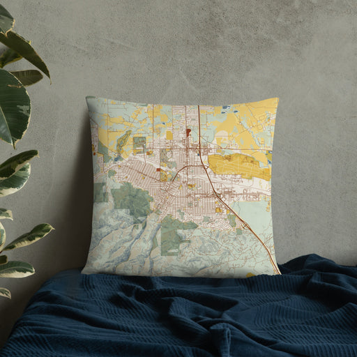 Custom Helena Montana Map Throw Pillow in Woodblock on Bedding Against Wall