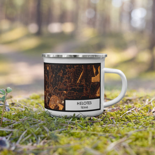 Right View Custom Helotes Texas Map Enamel Mug in Ember on Grass With Trees in Background