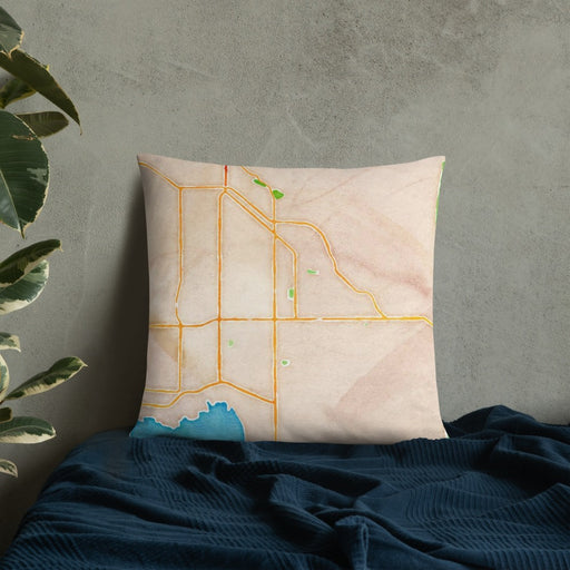 Custom Hemet California Map Throw Pillow in Watercolor on Bedding Against Wall