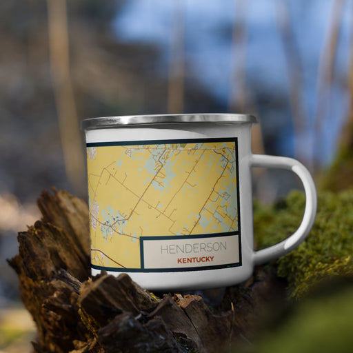Right View Custom Henderson Kentucky Map Enamel Mug in Woodblock on Grass With Trees in Background
