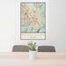 24x36 Henderson Nevada Map Print Portrait Orientation in Woodblock Style Behind 2 Chairs Table and Potted Plant