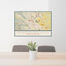 24x36 Hendersonville North Carolina Map Print Lanscape Orientation in Woodblock Style Behind 2 Chairs Table and Potted Plant