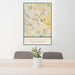 24x36 Hendersonville North Carolina Map Print Portrait Orientation in Woodblock Style Behind 2 Chairs Table and Potted Plant