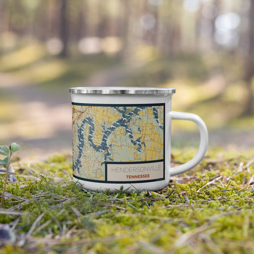Right View Custom Hendersonville Tennessee Map Enamel Mug in Woodblock on Grass With Trees in Background