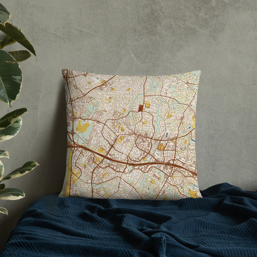 Custom Herndon Virginia Map Throw Pillow in Woodblock on Bedding Against Wall