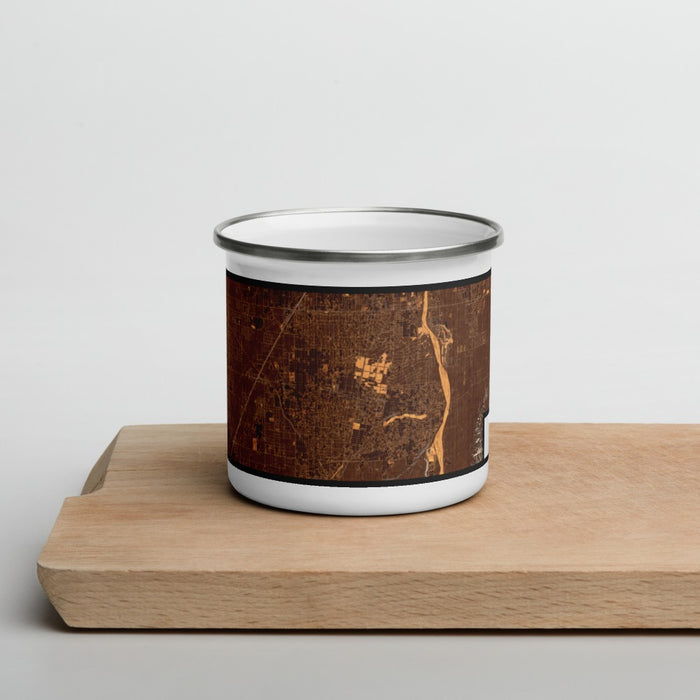 Front View Custom Hesperia California Map Enamel Mug in Ember on Cutting Board