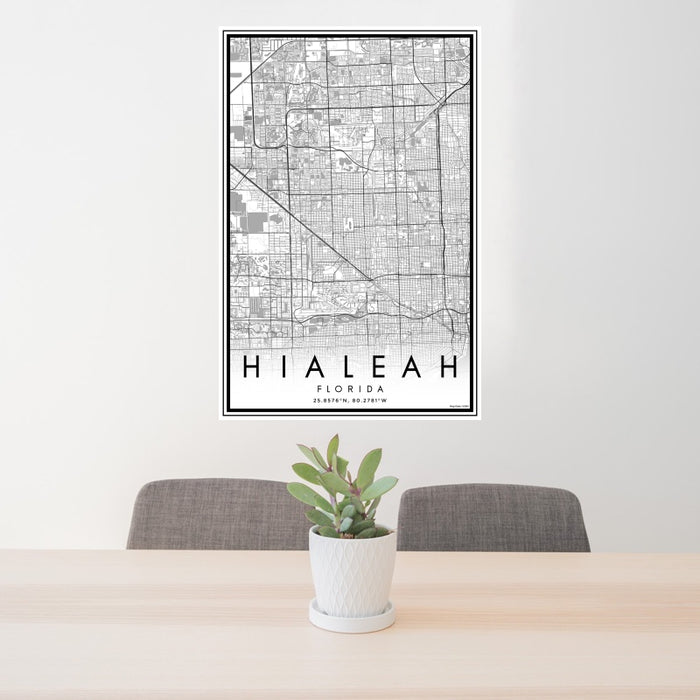 24x36 Hialeah Florida Map Print Portrait Orientation in Classic Style Behind 2 Chairs Table and Potted Plant