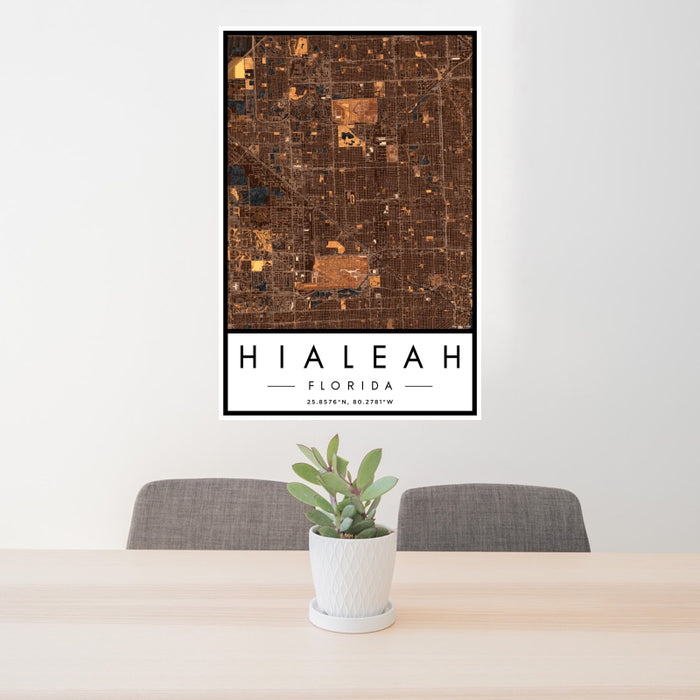 24x36 Hialeah Florida Map Print Portrait Orientation in Ember Style Behind 2 Chairs Table and Potted Plant