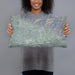 Person holding 20x12 Custom Highland California Map Throw Pillow in Afternoon