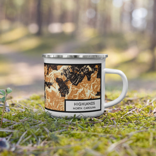 Right View Custom Highlands North Carolina Map Enamel Mug in Ember on Grass With Trees in Background