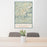 24x36 Highlands North Carolina Map Print Portrait Orientation in Woodblock Style Behind 2 Chairs Table and Potted Plant