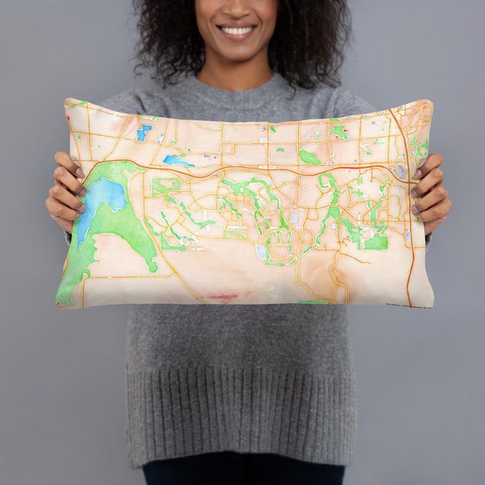 Person holding 20x12 Custom Highlands Ranch Colorado Map Throw Pillow in Watercolor