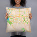 Person holding 18x18 Custom Highlands Ranch Colorado Map Throw Pillow in Watercolor