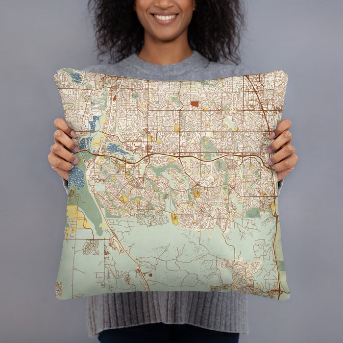 Person holding 18x18 Custom Highlands Ranch Colorado Map Throw Pillow in Woodblock