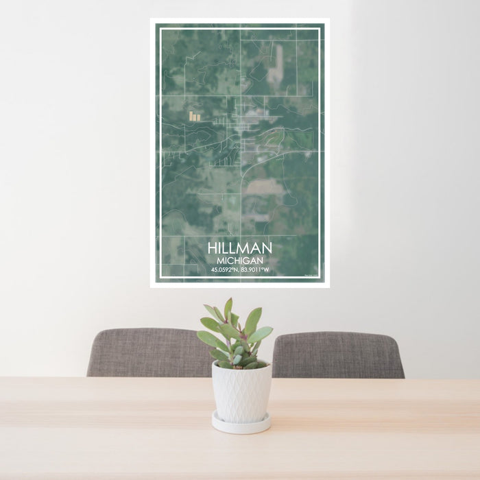 24x36 Hillman Michigan Map Print Portrait Orientation in Afternoon Style Behind 2 Chairs Table and Potted Plant