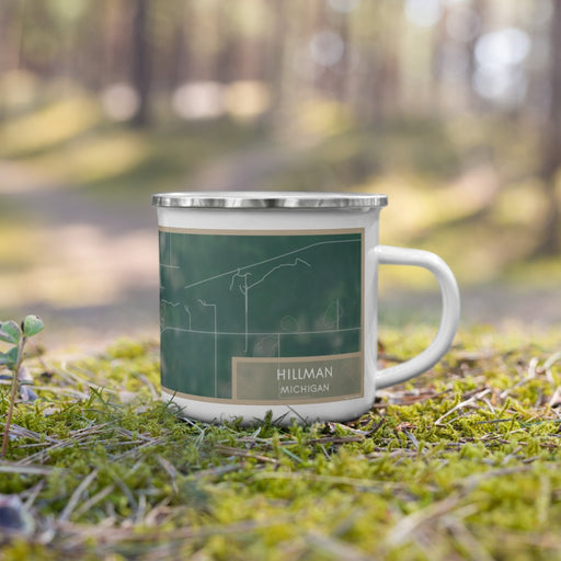 Right View Custom Hillman Michigan Map Enamel Mug in Afternoon on Grass With Trees in Background