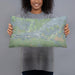 Person holding 20x12 Custom Holbrook Arizona Map Throw Pillow in Afternoon