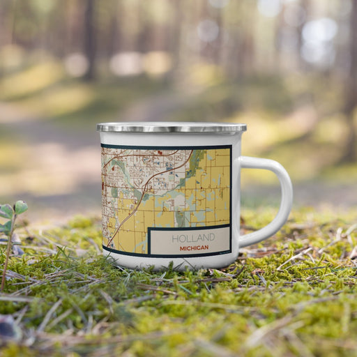 Right View Custom Holland Michigan Map Enamel Mug in Woodblock on Grass With Trees in Background