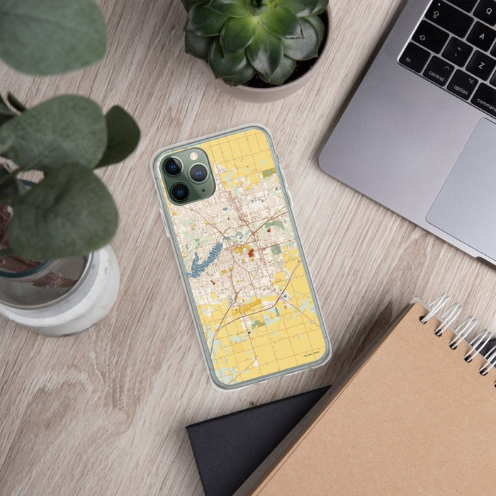 Custom Holland Michigan Map Phone Case in Woodblock on Table with Laptop and Plant