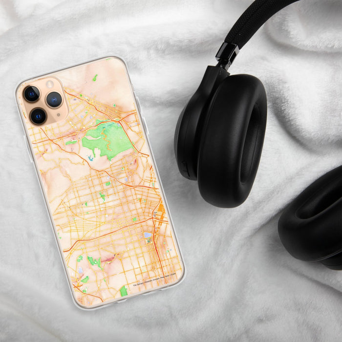 Custom Hollywood California Map Phone Case in Watercolor on Table with Black Headphones