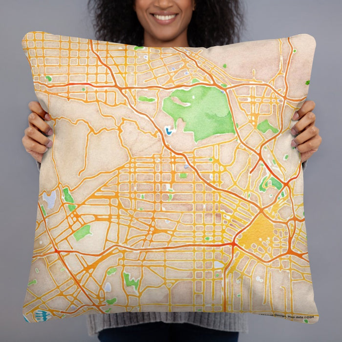 Person holding 22x22 Custom Hollywood California Map Throw Pillow in Watercolor