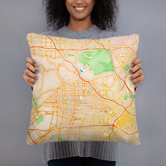 Person holding 18x18 Custom Hollywood California Map Throw Pillow in Watercolor