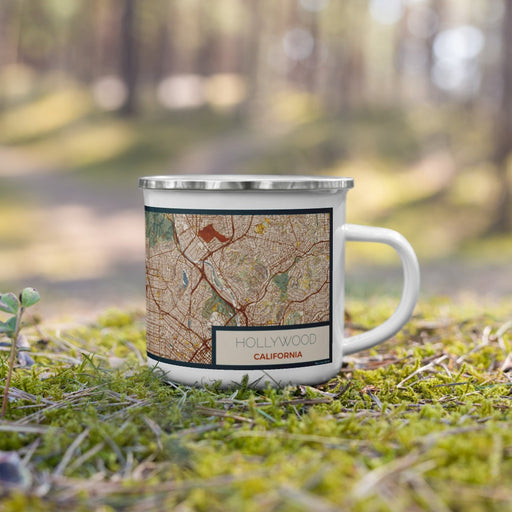 Right View Custom Hollywood California Map Enamel Mug in Woodblock on Grass With Trees in Background
