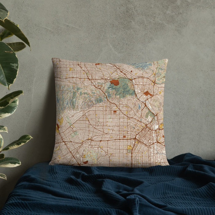 Custom Hollywood California Map Throw Pillow in Woodblock on Bedding Against Wall