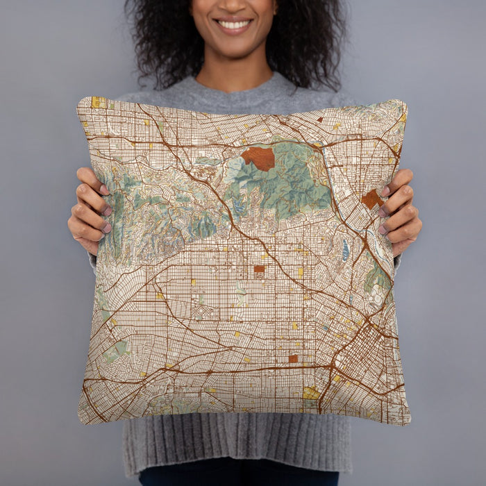Person holding 18x18 Custom Hollywood California Map Throw Pillow in Woodblock