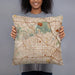 Person holding 18x18 Custom Hollywood California Map Throw Pillow in Woodblock