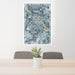 24x36 Homedale Idaho Map Print Portrait Orientation in Afternoon Style Behind 2 Chairs Table and Potted Plant