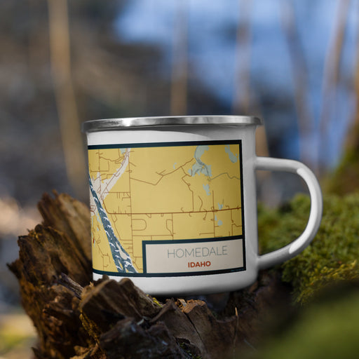 Right View Custom Homedale Idaho Map Enamel Mug in Woodblock on Grass With Trees in Background