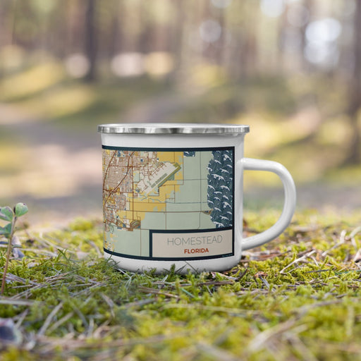 Right View Custom Homestead Florida Map Enamel Mug in Woodblock on Grass With Trees in Background
