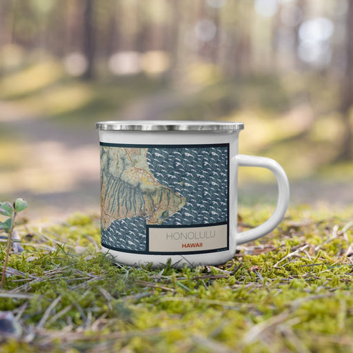 Right View Custom Honolulu Hawaii Map Enamel Mug in Woodblock on Grass With Trees in Background