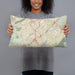 Person holding 20x12 Custom Hoover Alabama Map Throw Pillow in Woodblock