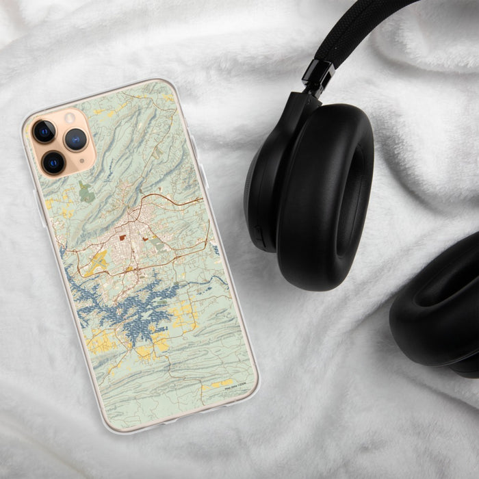 Custom Hot Springs Arkansas Map Phone Case in Woodblock on Table with Black Headphones