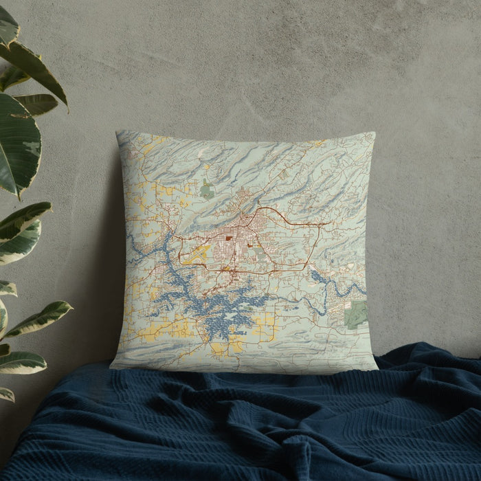 Custom Hot Springs Arkansas Map Throw Pillow in Woodblock on Bedding Against Wall