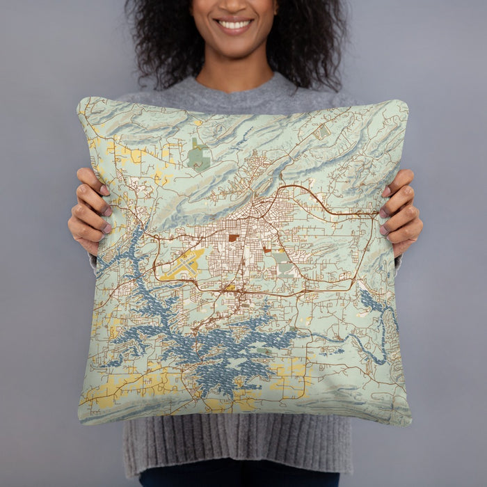 Person holding 18x18 Custom Hot Springs Arkansas Map Throw Pillow in Woodblock