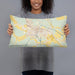 Person holding 20x12 Custom Houma Louisiana Map Throw Pillow in Woodblock