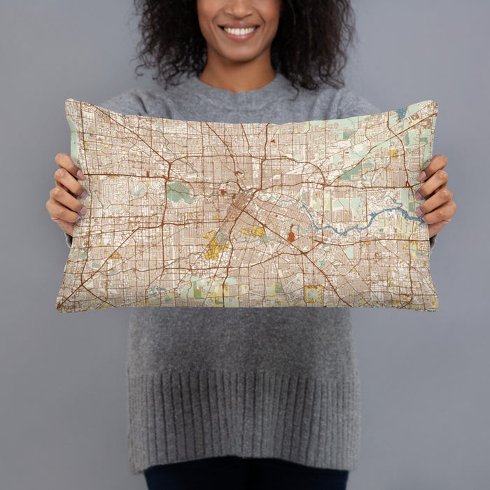 Person holding 20x12 Custom Houston Texas Map Throw Pillow in Woodblock
