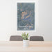 24x36 Humphreys Peak Arizona Map Print Portrait Orientation in Afternoon Style Behind 2 Chairs Table and Potted Plant