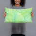 Person holding 20x12 Custom Humphreys Peak Arizona Map Throw Pillow in Watercolor
