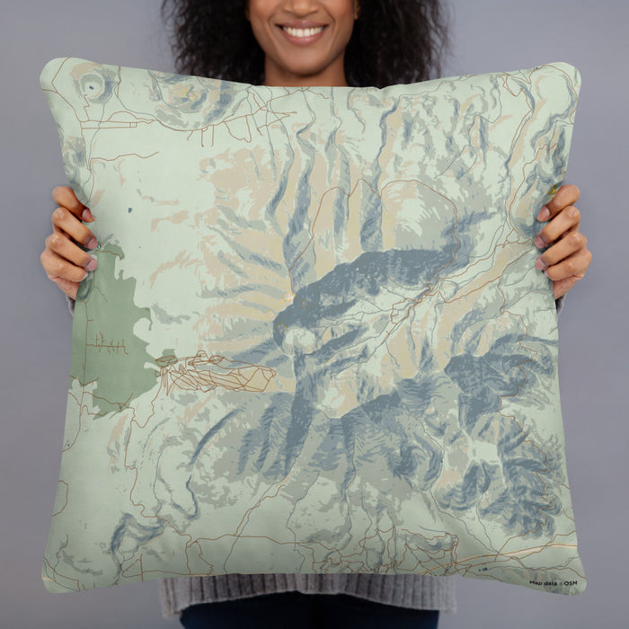 Person holding 22x22 Custom Humphreys Peak Arizona Map Throw Pillow in Woodblock
